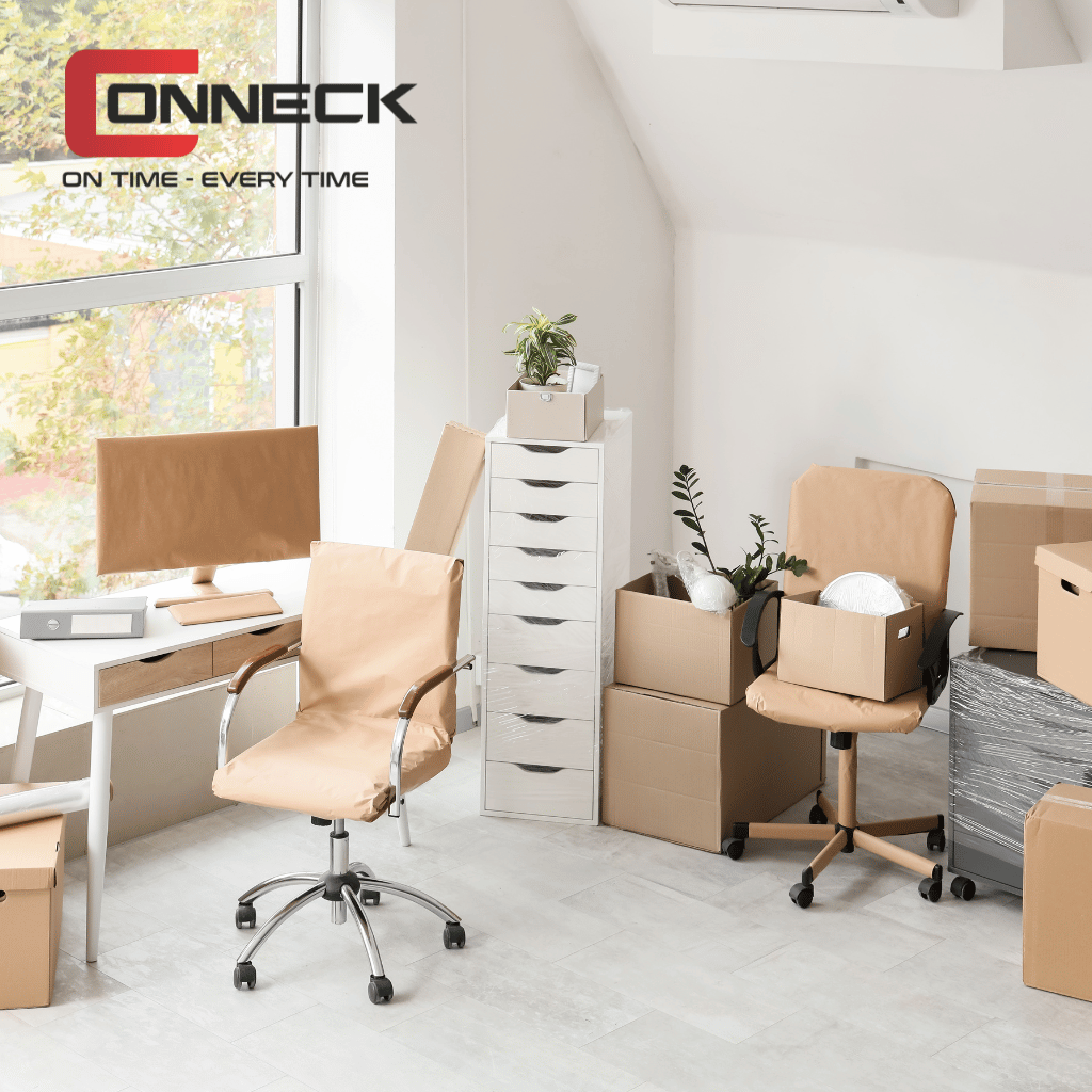 Professional movers from Conneck Transport, a trusted Moving Company in Kempton Park, wrapping furniture for a residential move
